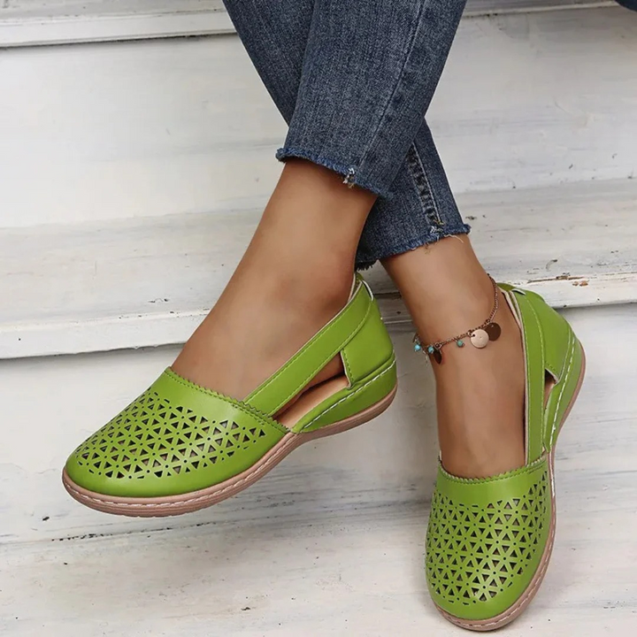 Summer women's orthopedic sandals, comfortable slip-on flats with arch support and a modern design.