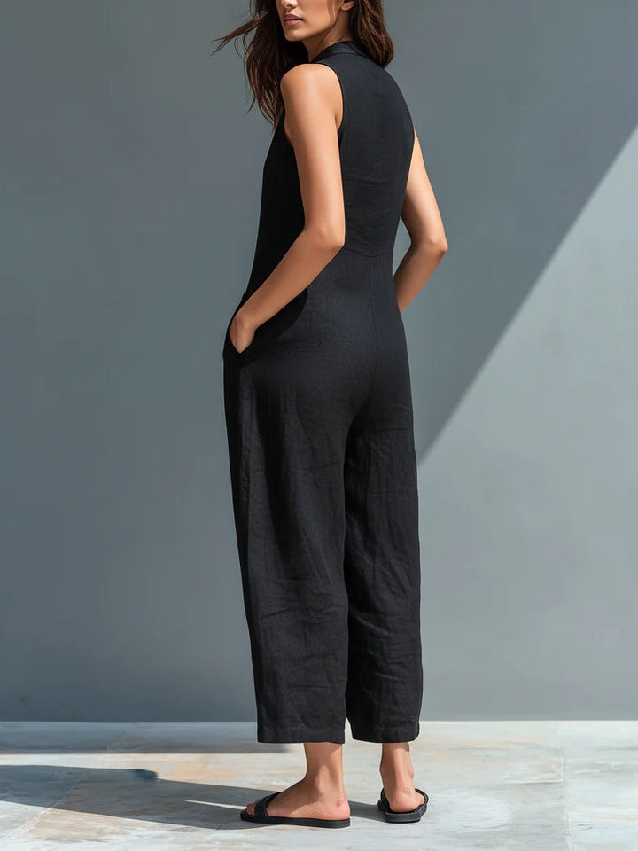 Sleeveless loose-fit black jumpsuit for women, perfect for elegant casual summer and spring fashion. Easy wear.