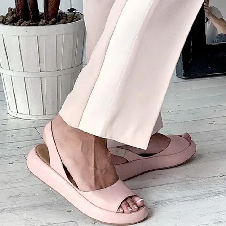 Stylish & comfortable women's open-toe slip-on sandals, ideal for warm weather and everyday casual wear.