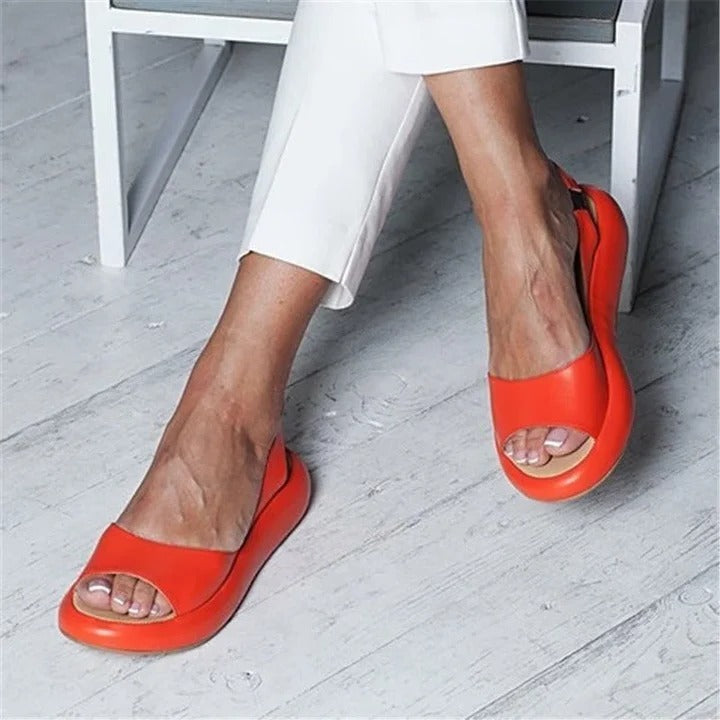 Women's casual slip-on sandals with soft cushioned footbed, elastic straps, and open toe design for comfort.