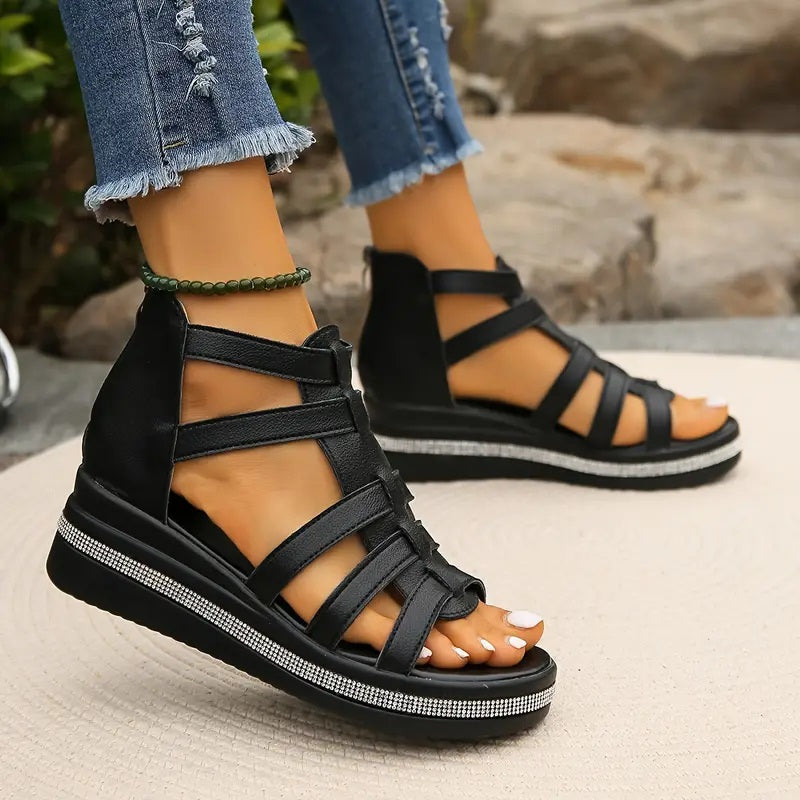 Women's slip-on wedge sandals styled for a casual summer day, offering comfortable and versatile footwear.