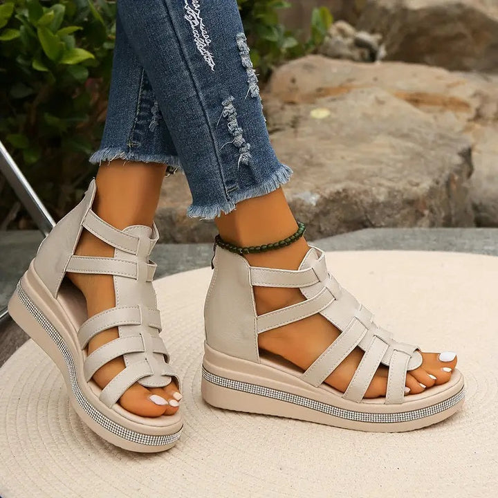 Back view of comfortable women's wedge sandals, providing elevated style and support for everyday wear.