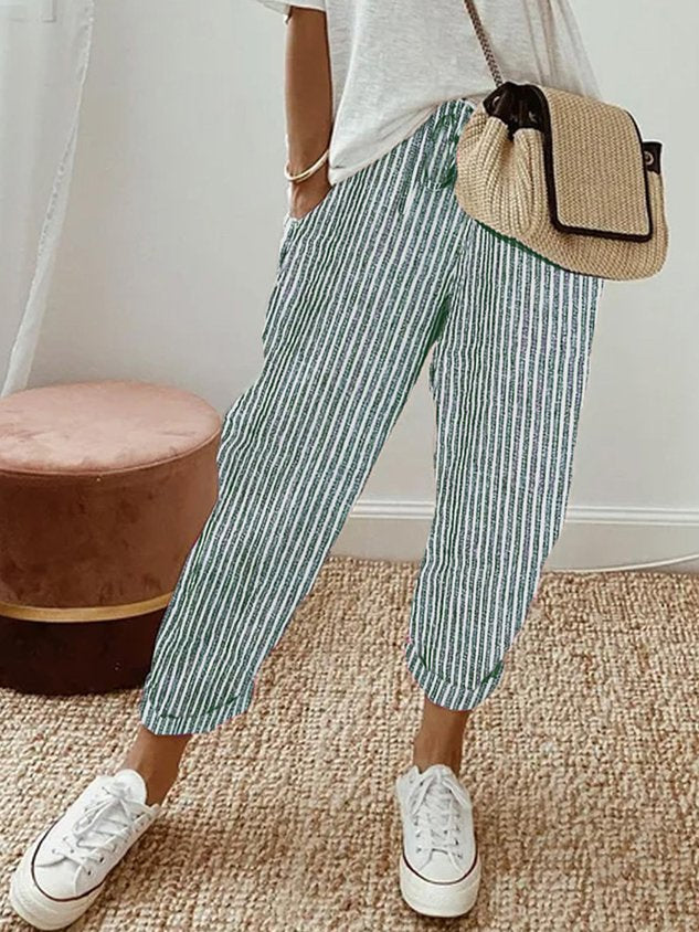 Elegant women's relaxed fit summer pants with a comfortable drawstring, great for everyday casual style.