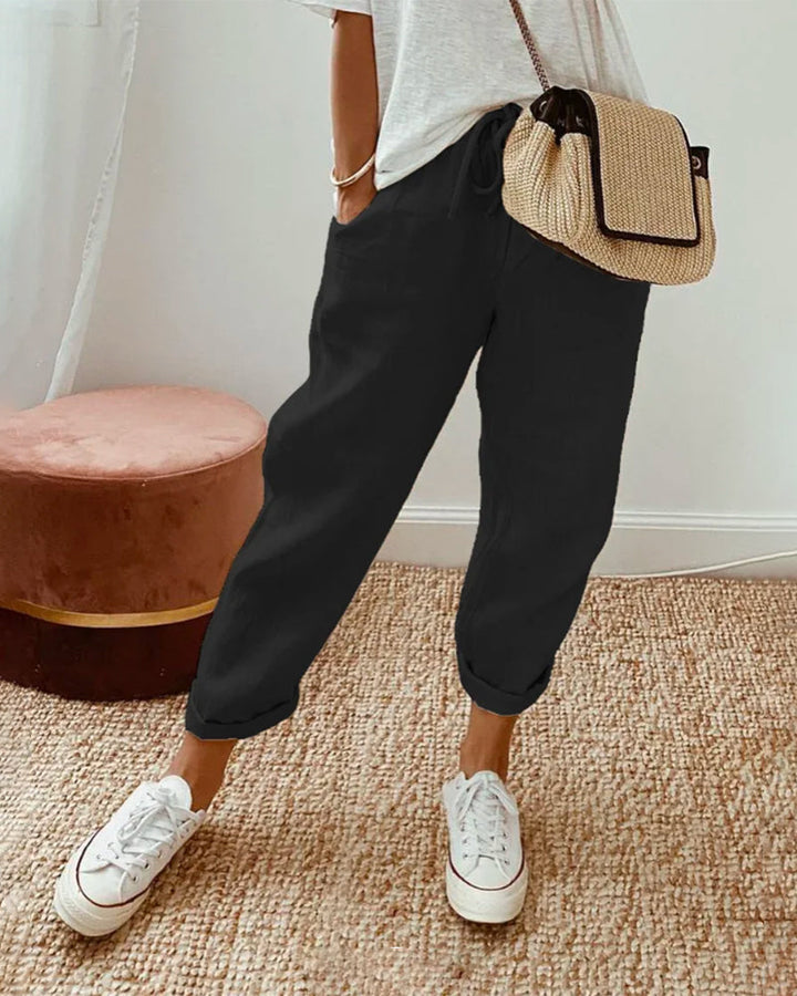 Versatile women's casual summer pants with comfy drawstring and relaxed fit for warm weather fashion.