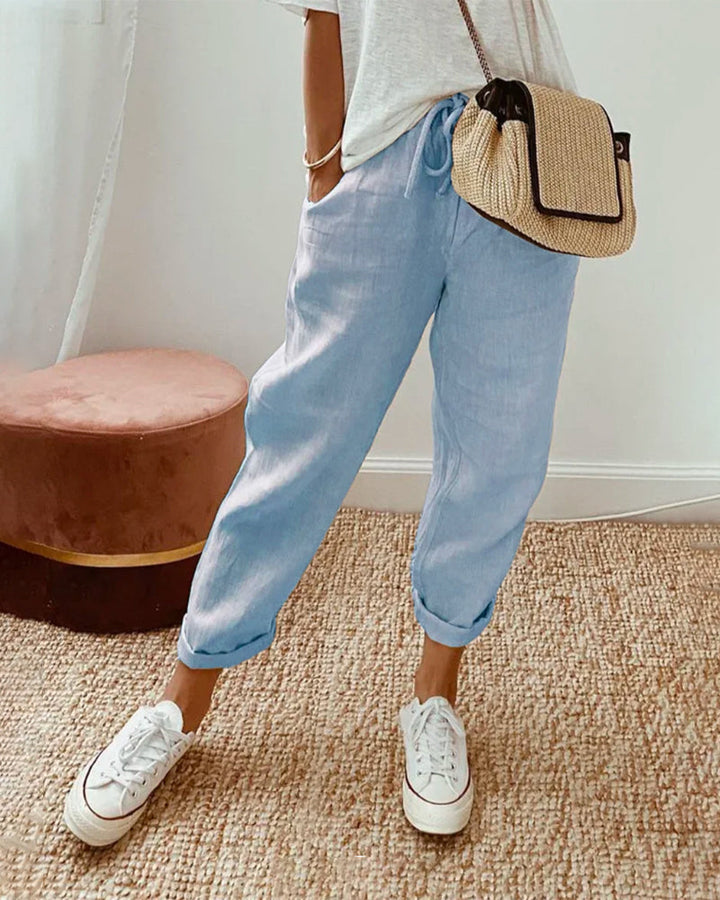 Stylish women's relaxed fit summer pants with adjustable drawstring, great for comfort & warm weather.