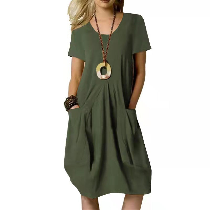 Comfortable women's summer pocket swing dress. Ideal for casual everyday wear. Relaxed fit, solid color.