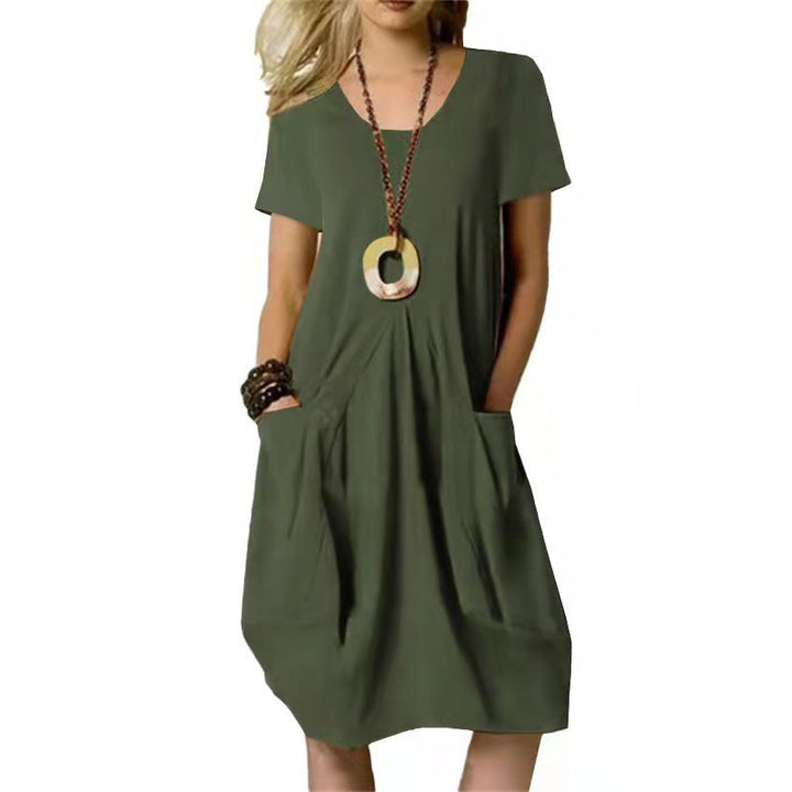 Comfortable women's summer pocket swing dress. Ideal for casual everyday wear. Relaxed fit, solid color.