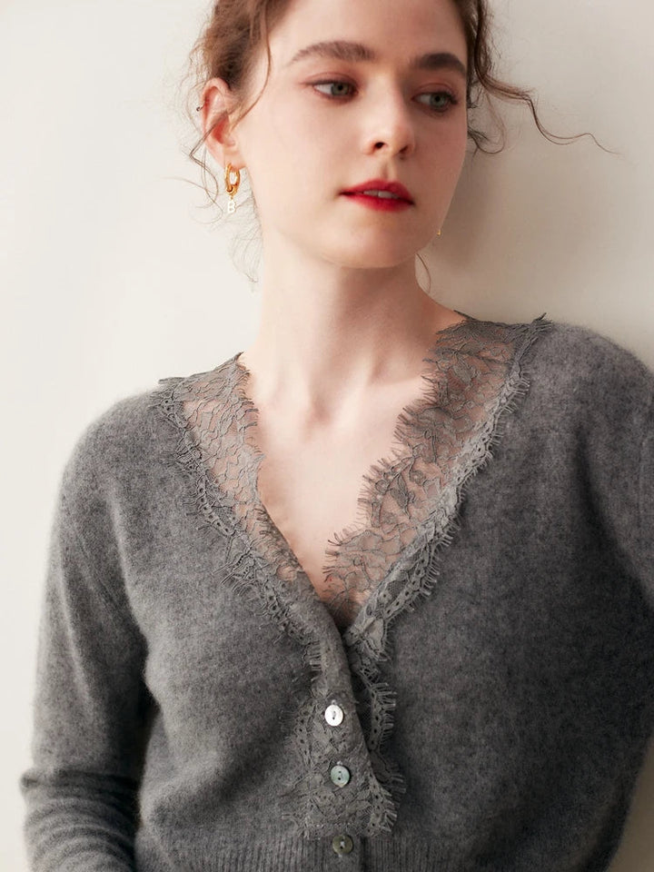 Stylish women's cashmere cardigan with intricate lace detail, a versatile layering piece.