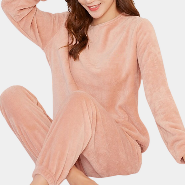 Warm women's two-piece loungewear set, a comfortable and cozy fleece outfit for relaxing.