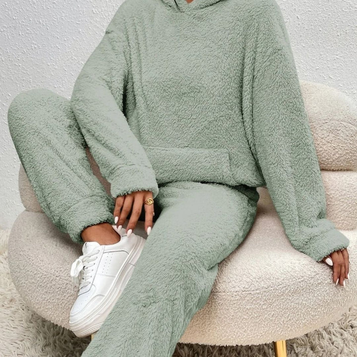 Fashionable women's two-piece hooded lounge set for spring, great for home or casual outings, cozy.