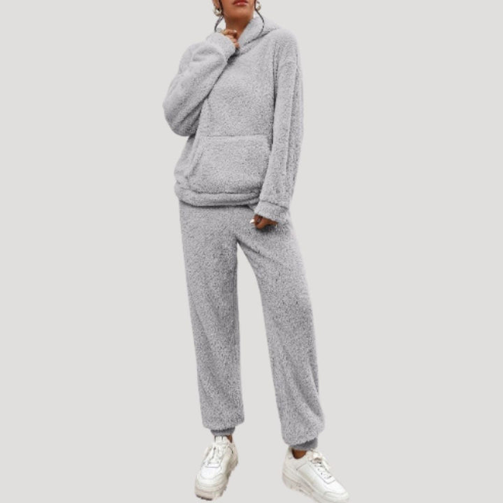 Matching two-piece hooded lounge set for women, offering cozy comfort and versatile spring fashion.