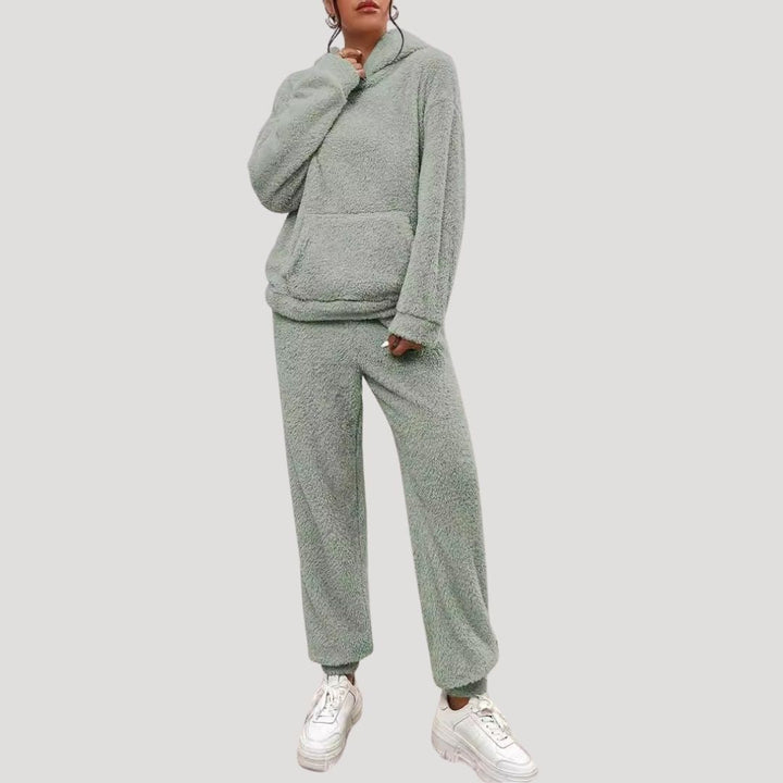 Relaxed women's lounge set with hood, a perfect spring athleisure ensemble for comfort and style.