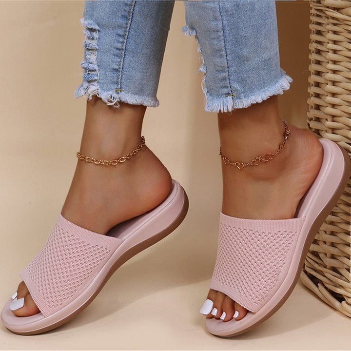 Stylish women's open-toe knit slippers for ultimate comfort. Casual summer house shoes with a soft, breathable design.