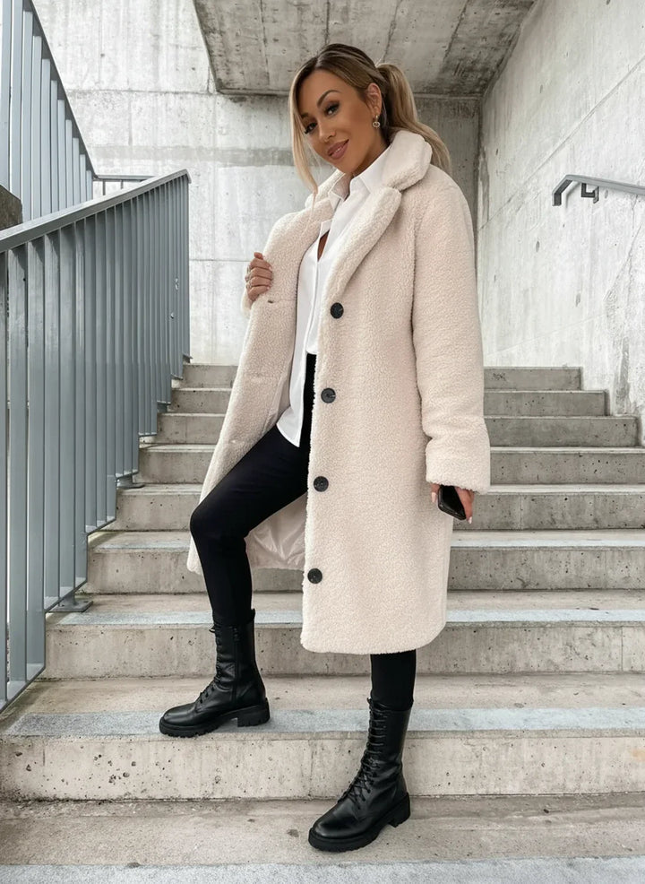 Stylish women's plush teddy long coat, ideal fall & winter outerwear for a cozy and trendy look.