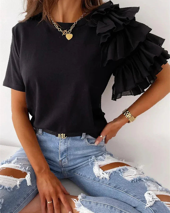 Casual chic women's crew neck t-shirt featuring stylish asymmetrical tiered ruffle sleeves. Perfect new arrival fashion tee.