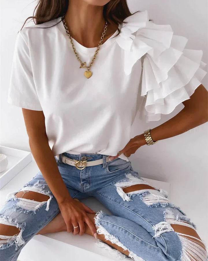 Elegant women's crew neck t-shirt with eye-catching asymmetrical tiered ruffle sleeves. A stylish, versatile summer top.