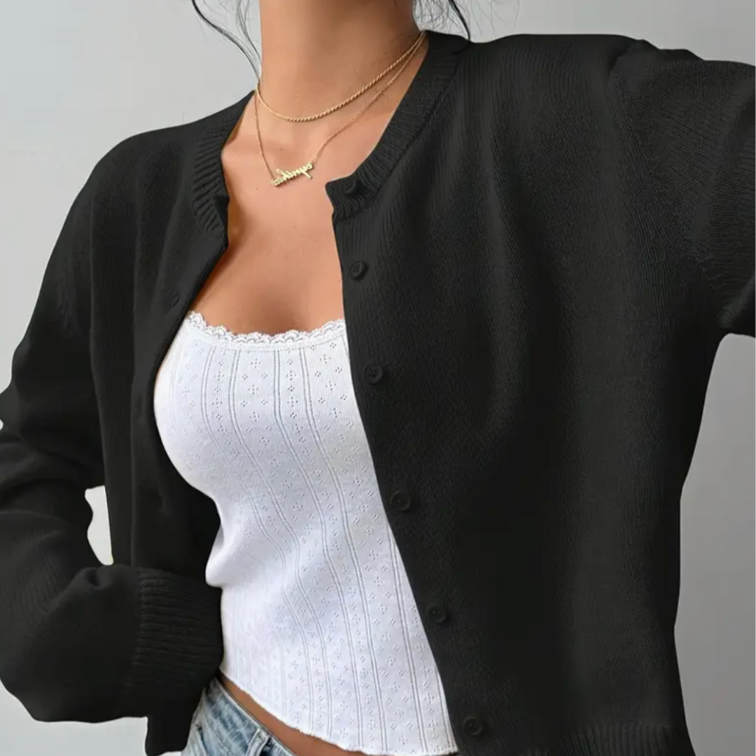 Green women's cropped button-front cardigan, perfect for layering over dresses or tank tops.