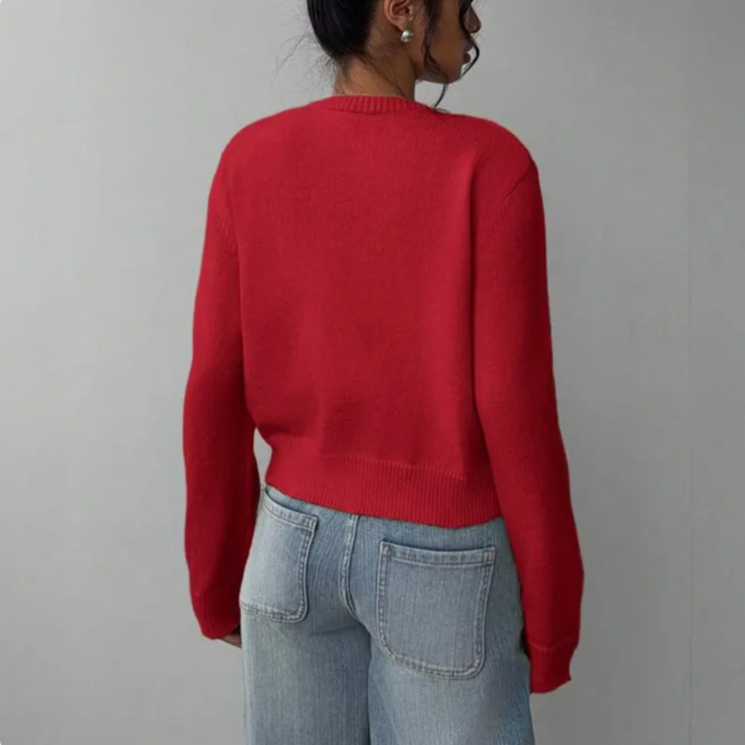 Solid grey women's cropped cardigan, offering a minimalist yet stylish look for everyday wear.