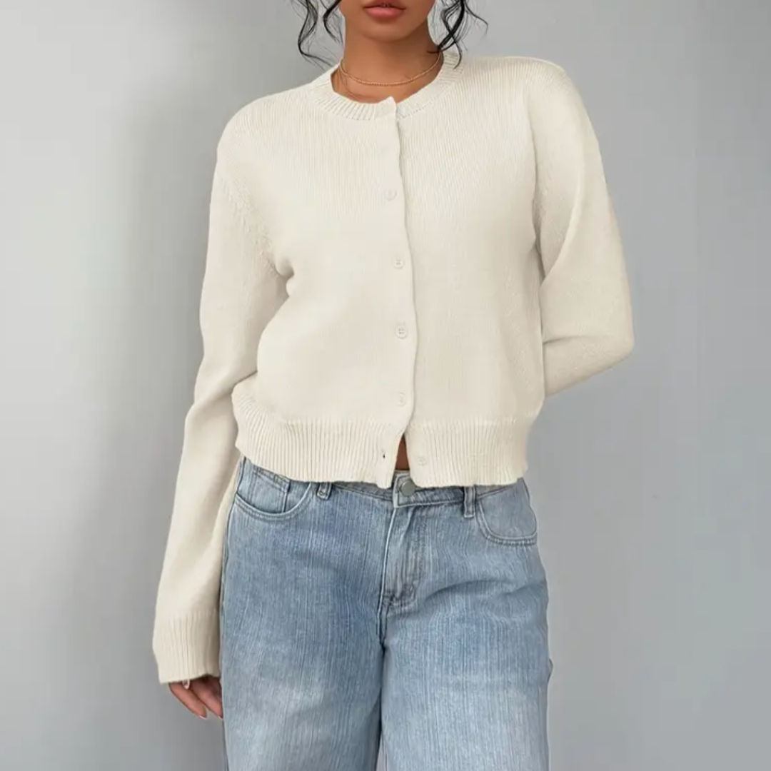 Lightweight women's cropped button-front cardigan in a classic beige, ideal for versatile layering.