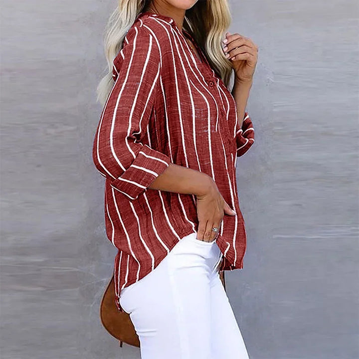 Sky blue striped women's summer V-neck shirt, designed with a relaxed fit for ultimate comfort & style.