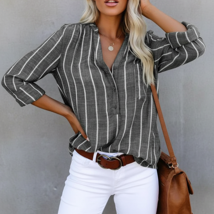 Women's striped V-neck summer top, relaxed fit, perfect for casual fashion and comfortable everyday style.