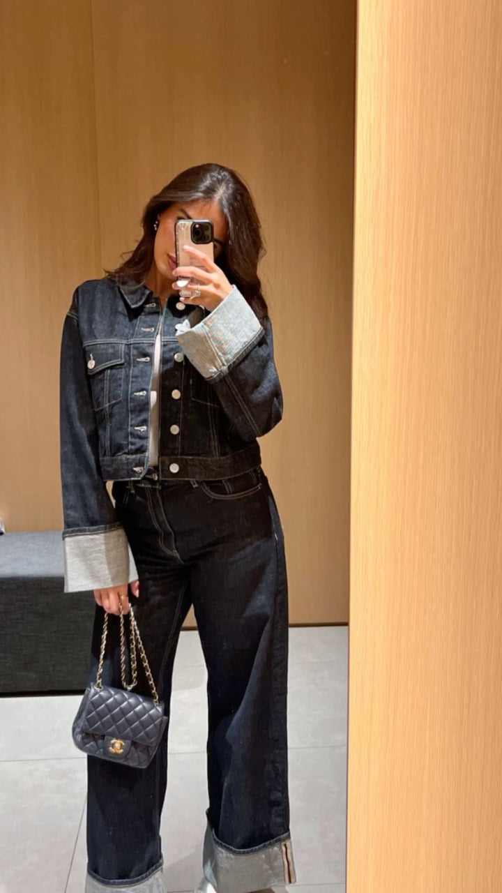 Front view of women's blue denim cropped jacket and matching pants co-ord outfit