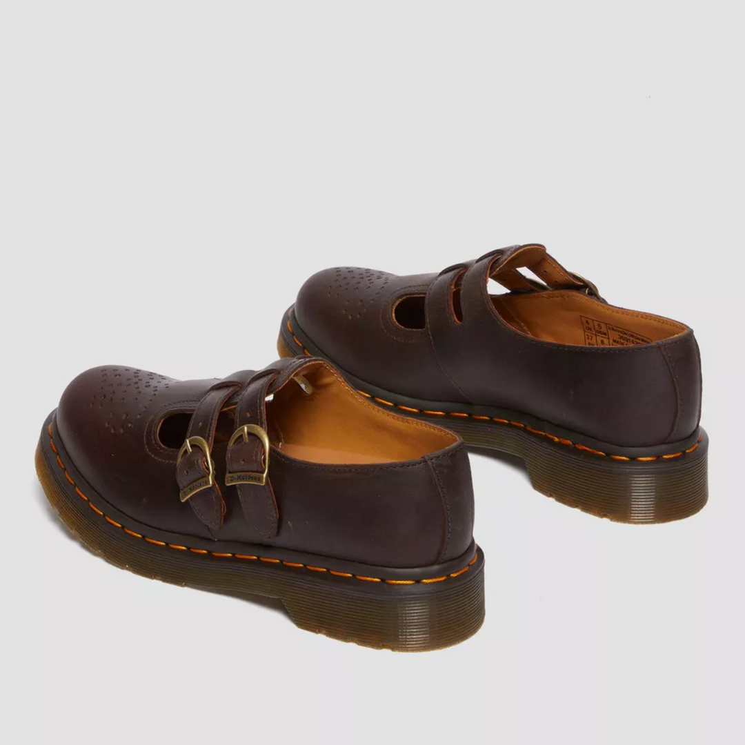 Classic black Mary Janes for women, featuring two buckles for a secure and stylish fit.
