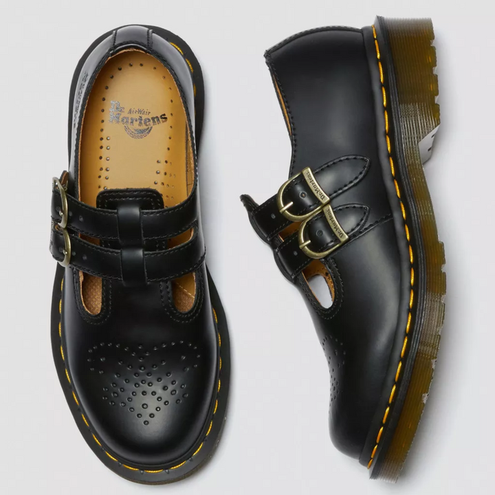 Comfortable women's Mary Janes in black with double buckle accents, vintage-inspired everyday shoes.