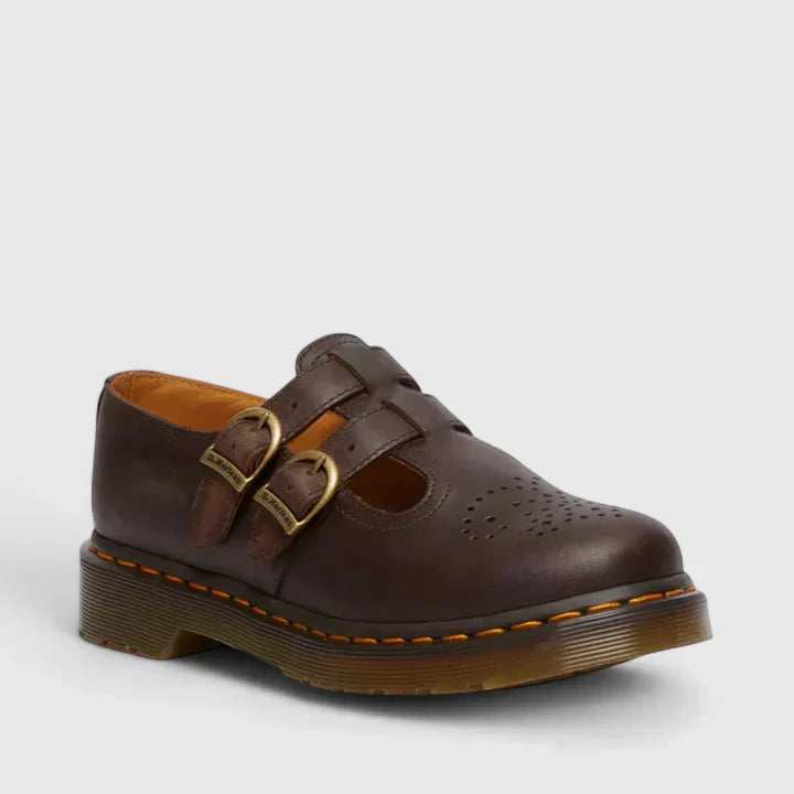 Front view of black women's Mary Janes, showcasing the stylish double buckle closures.