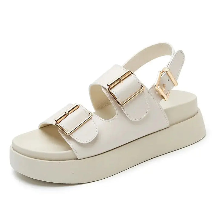 Women's black open-toe platform sandals with two adjustable buckles, a comfortable casual option