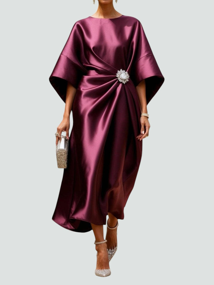 Elegant women's draped midi dress featuring stylish batwing sleeves and a flattering loose fit.