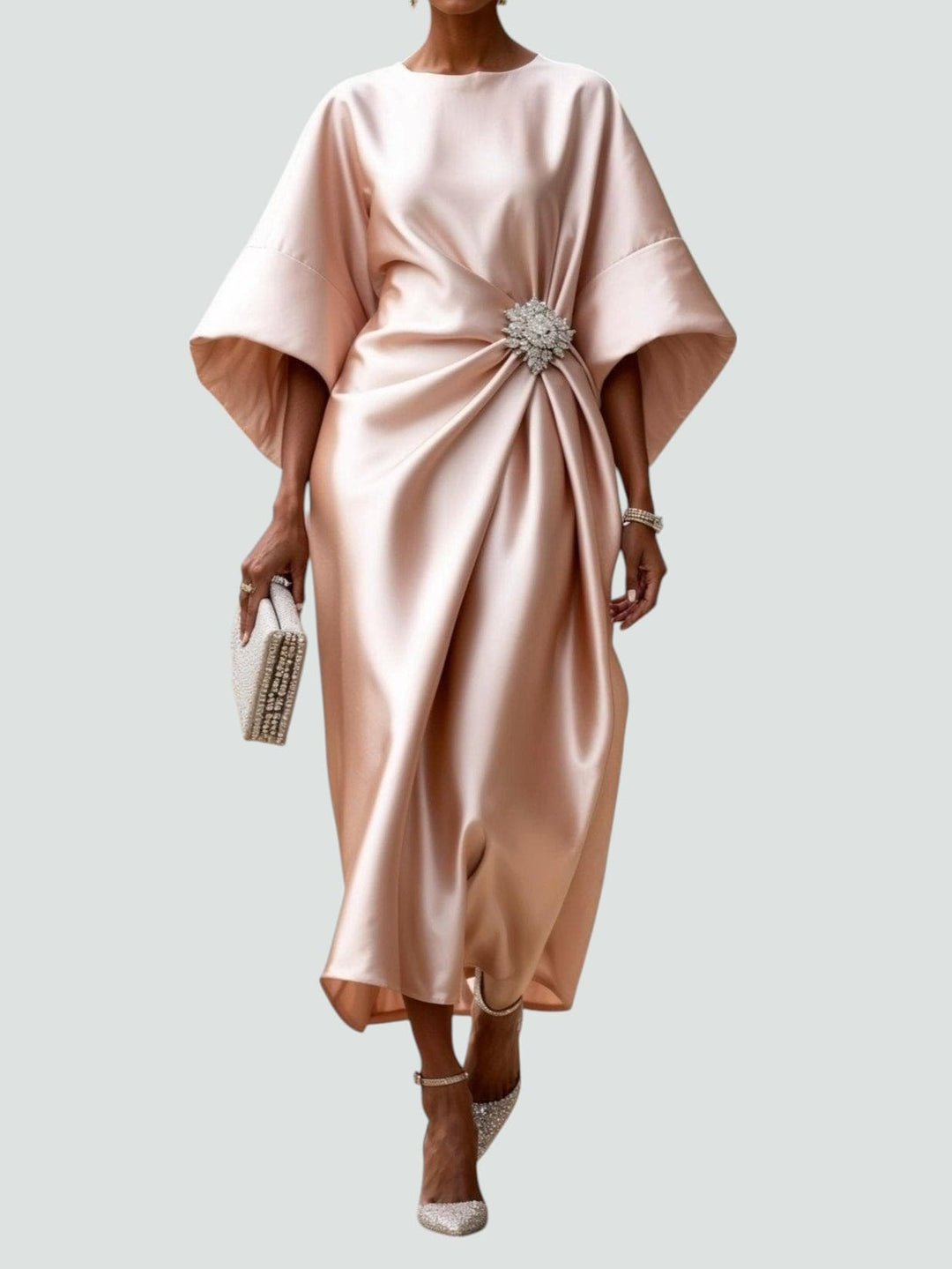 Stylish women's midi dress featuring unique batwing sleeves, draped silhouette, and asymmetrical hem.