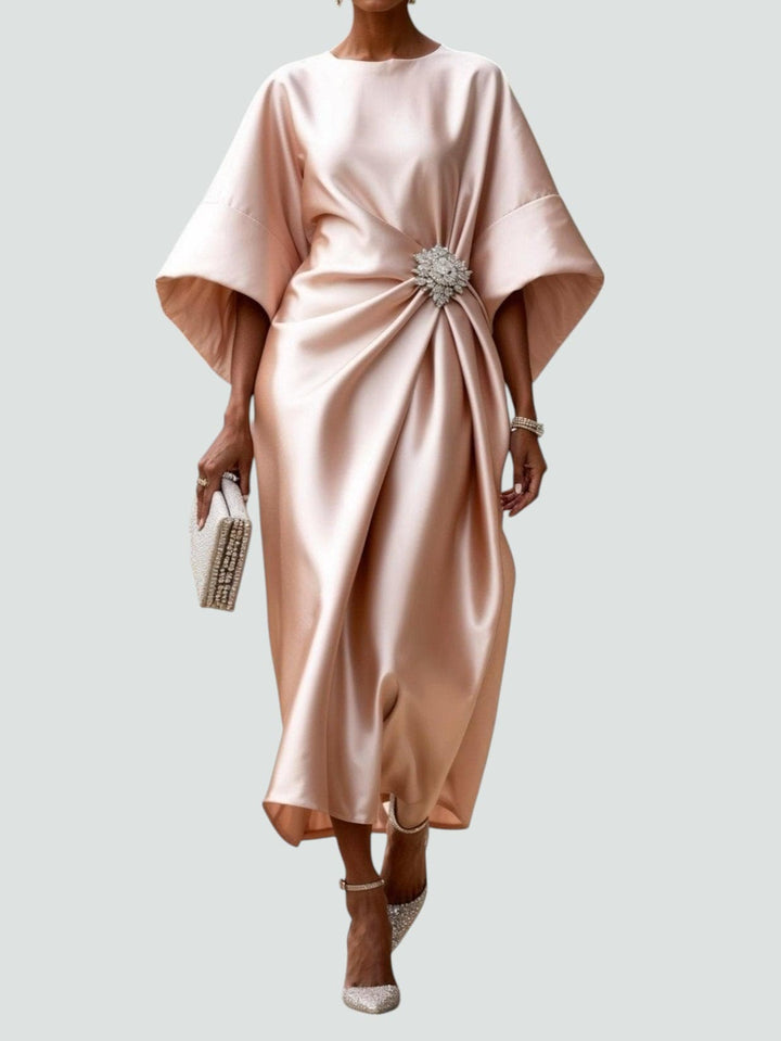 Stylish women's midi dress featuring unique batwing sleeves, draped silhouette, and asymmetrical hem.