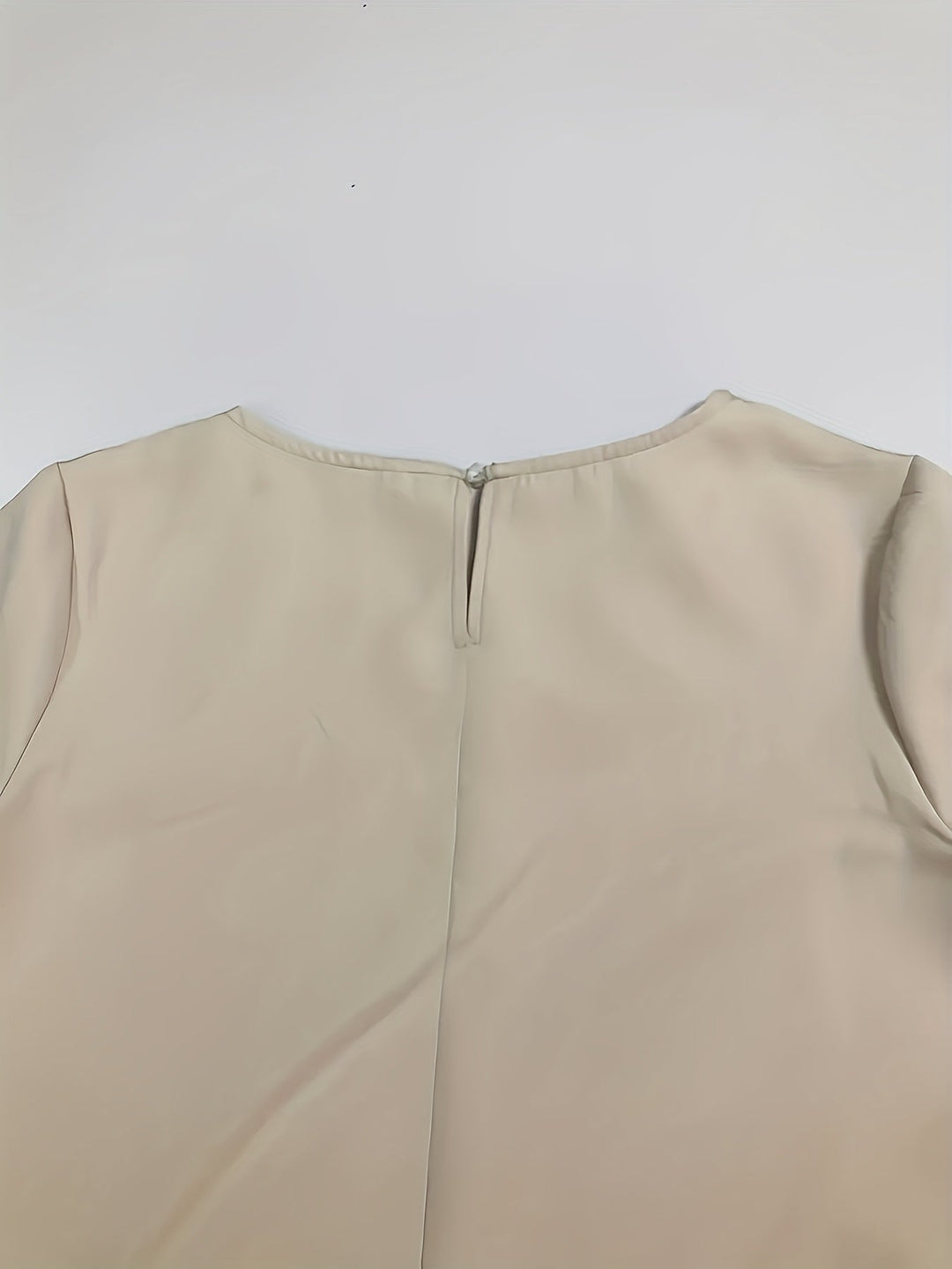 Simple elegant women's comfort dress with rounded neck, three-quarter sleeves for any occasion.