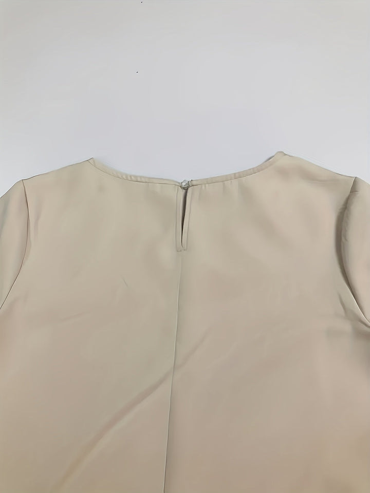Simple elegant women's comfort dress with rounded neck, three-quarter sleeves for any occasion.