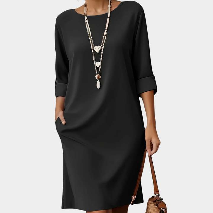Versatile women's comfort dress, ideal for casual outings, office, or events. Three-quarter sleeves.