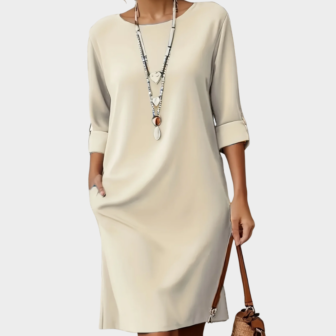 Casual women's all-day comfort dress with rounded neck, perfect for relaxed daywear.