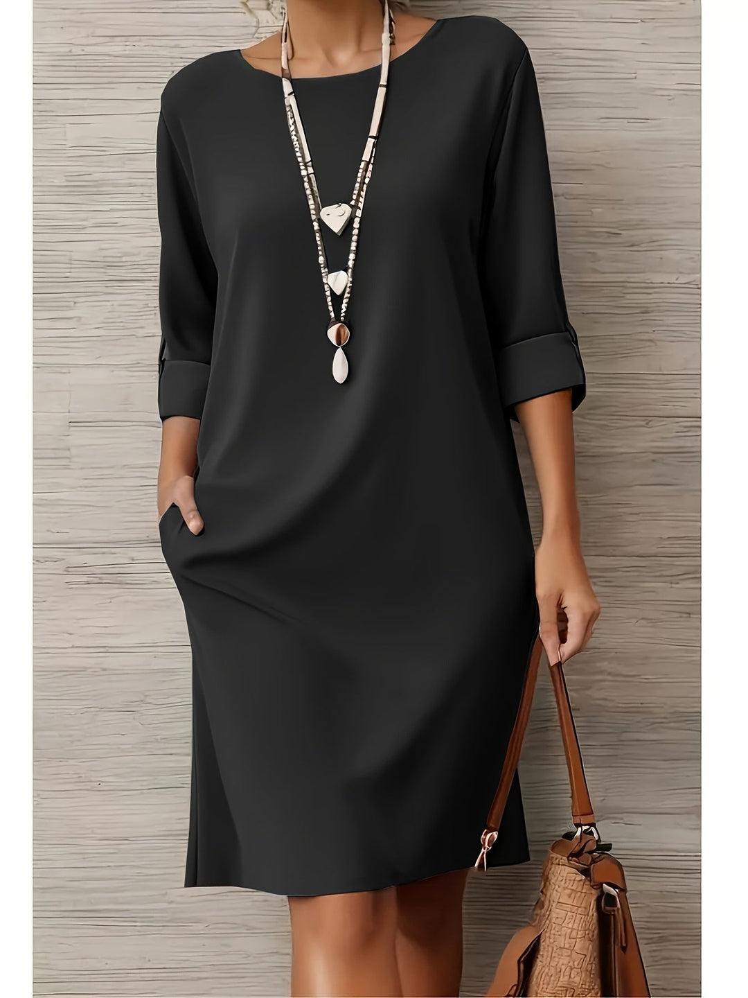 Chic women's comfort dress, versatile for events or elegant daywear. Effortless style.