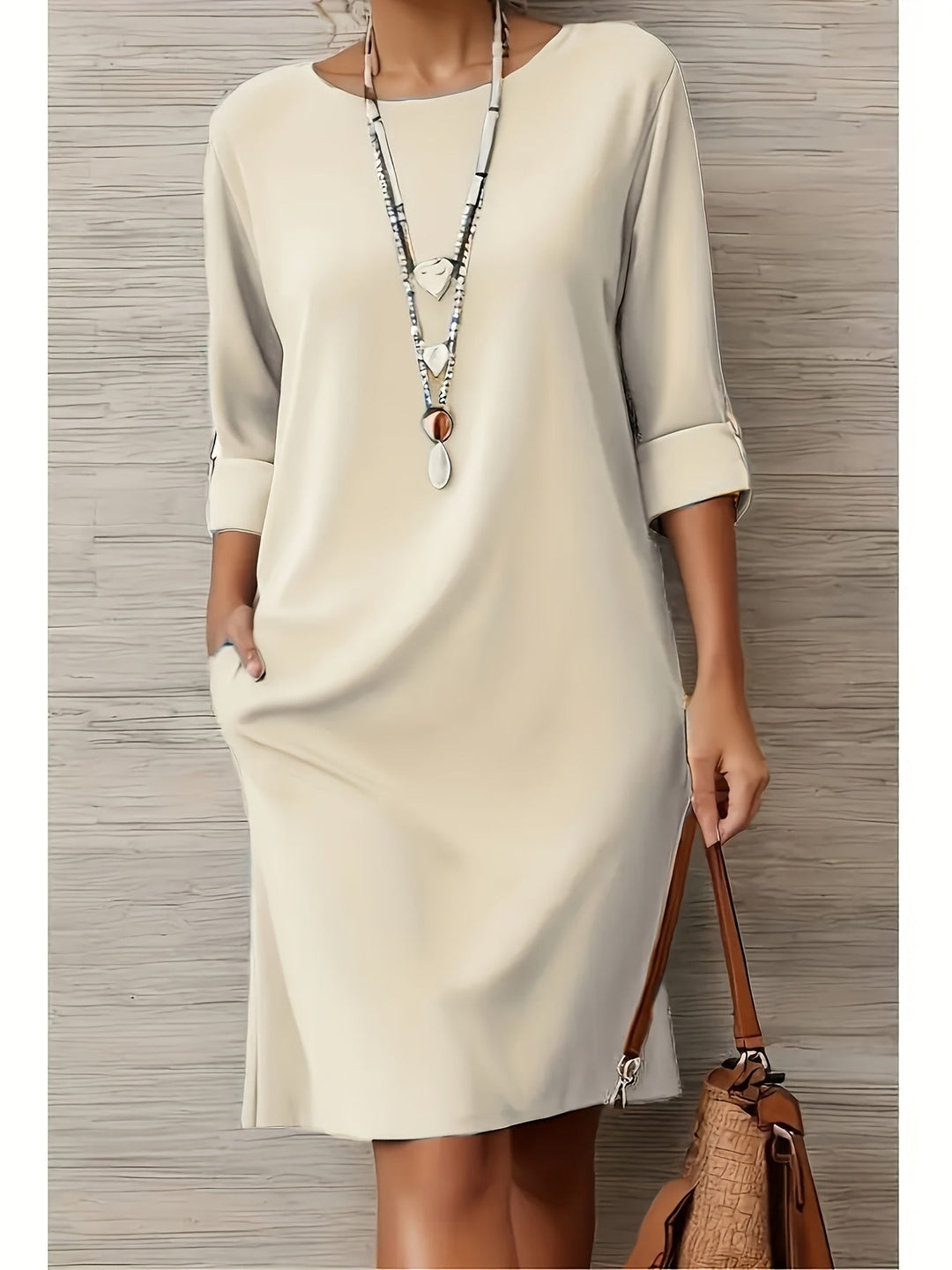 Close-up of soft fabric on women's all-day comfort dress, ideal for everyday luxury.