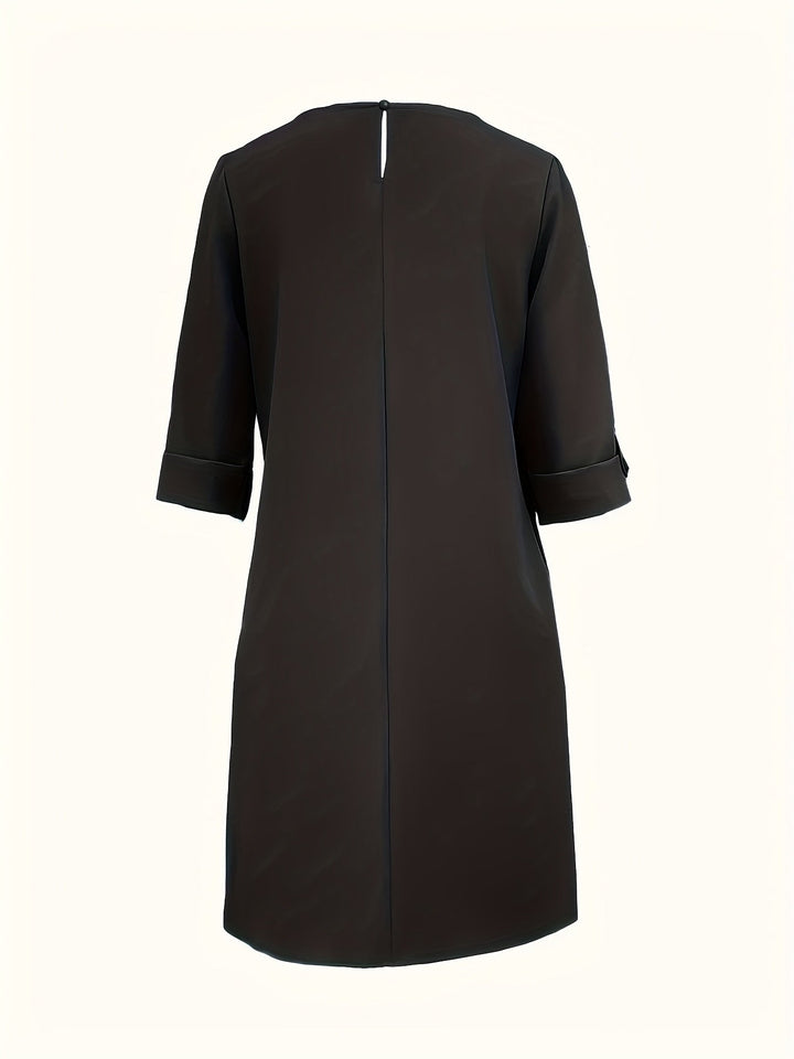 Model wearing a women's effortless all-day comfort dress, showing versatile fit & style.