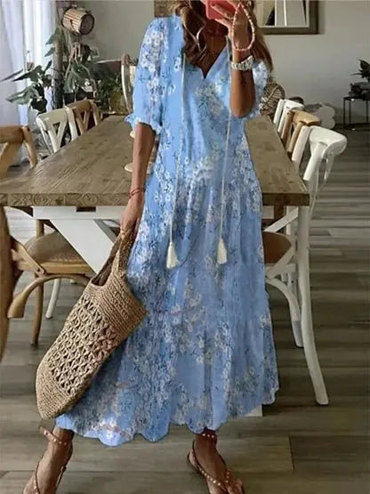 Elegant women's bohemian A-line dress with flattering v-neck and geometric pattern, a chic long sleeve summer dress.