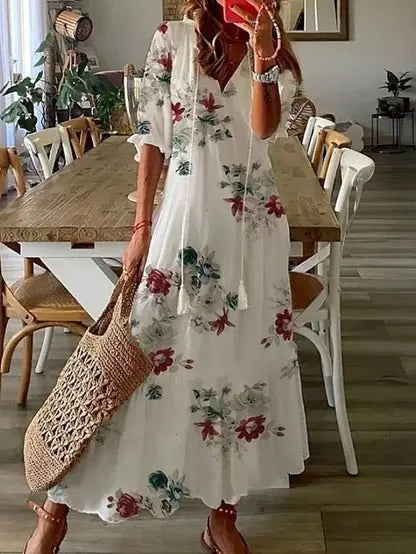 Flattering women's boho A-line dress with long sleeves, v-neck, and stylish geometric print, perfect for summer.