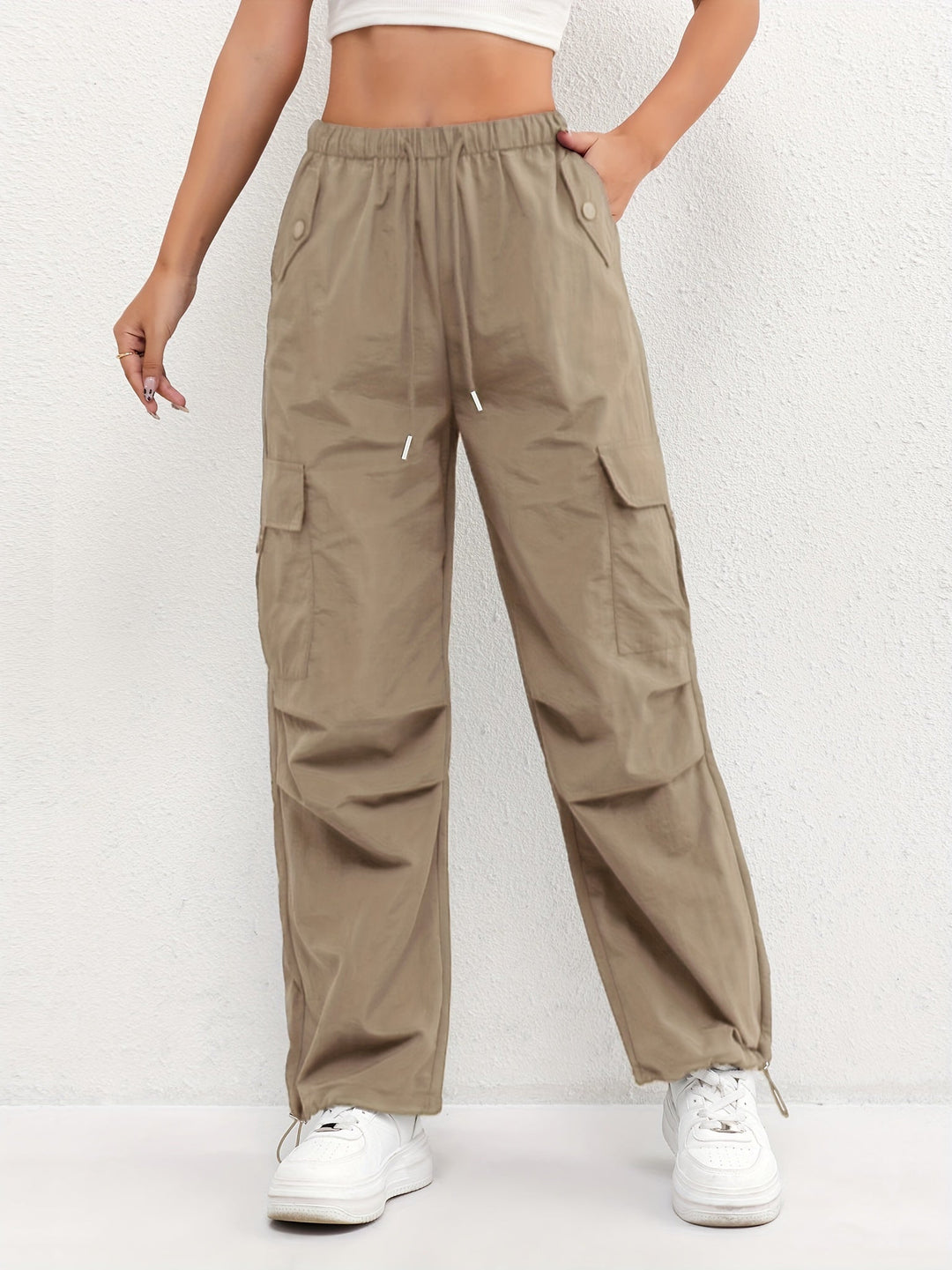 Effortless women's relaxed fit cargo parachute pants with drawstring waist, ultimate comfort for daily wear.
