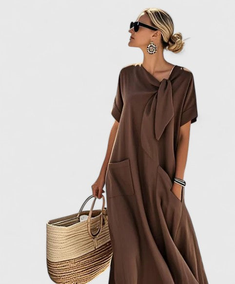Women's effortless flowy summer dress, perfect for casual daywear or elegant evening events. Soft, comfortable fabric.