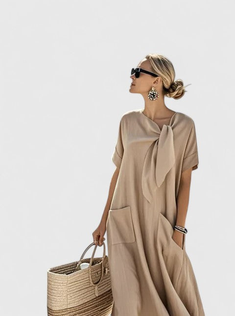 Casual yet elegant women's flowy summer dress, designed for ultimate comfort and versatile style from day to night.