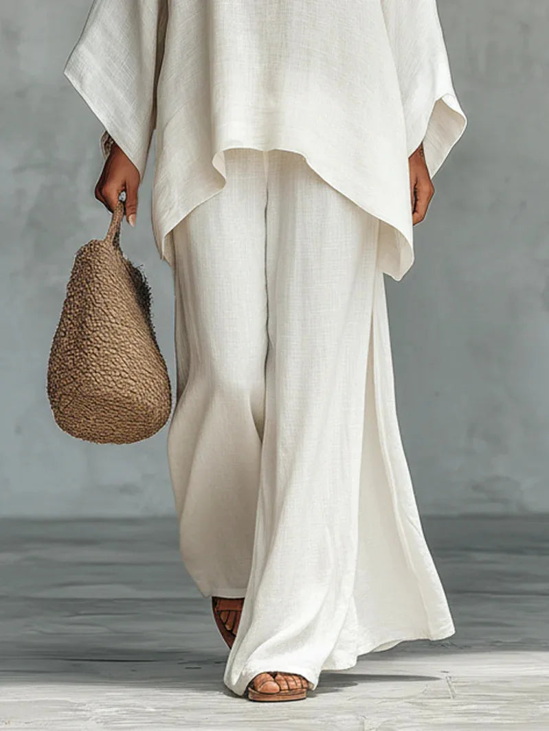 Relaxed fit linen blend two-piece set for women. Comfortable, stylish, ideal for vacation wear & summer outfits.