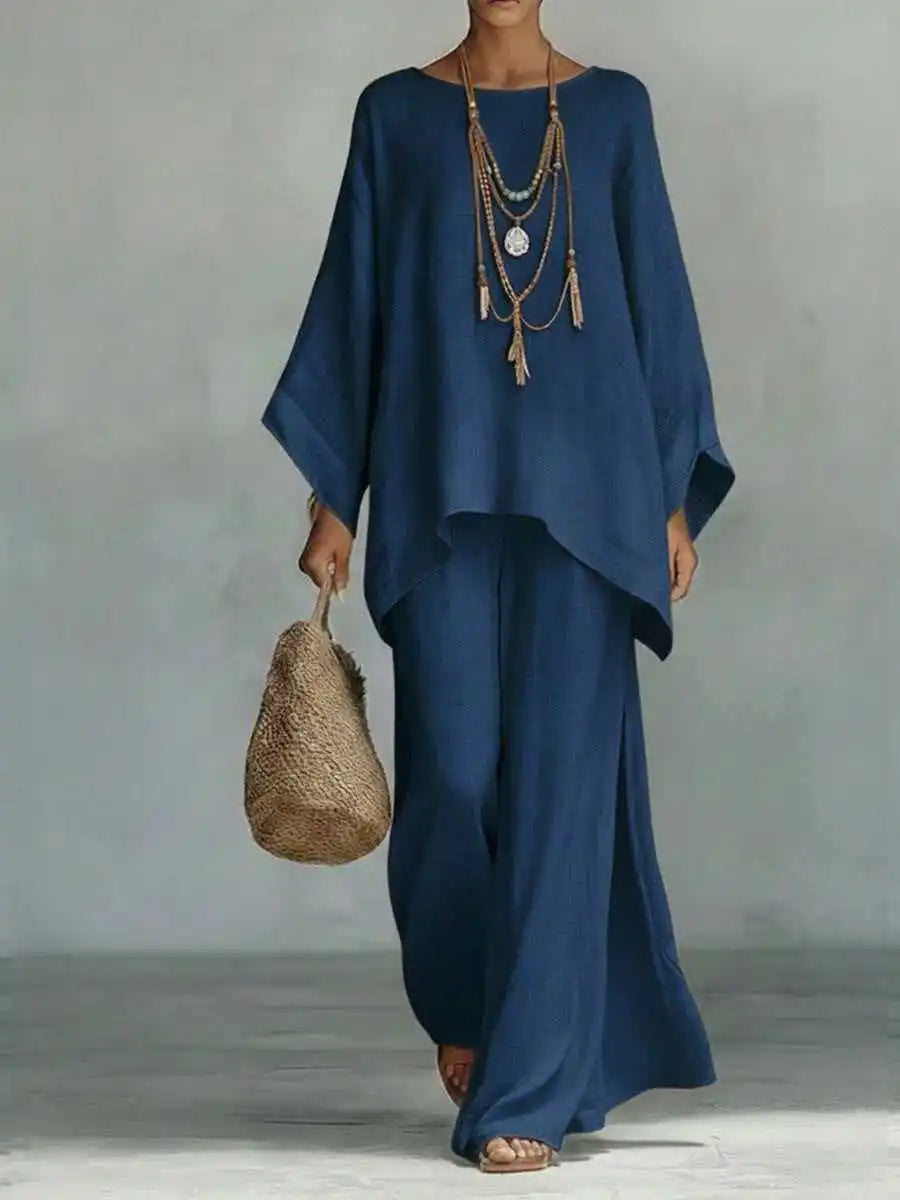 Woman wearing a comfortable linen blend two-piece set. Ideal for relaxed summer days, casual outings, or vacation.