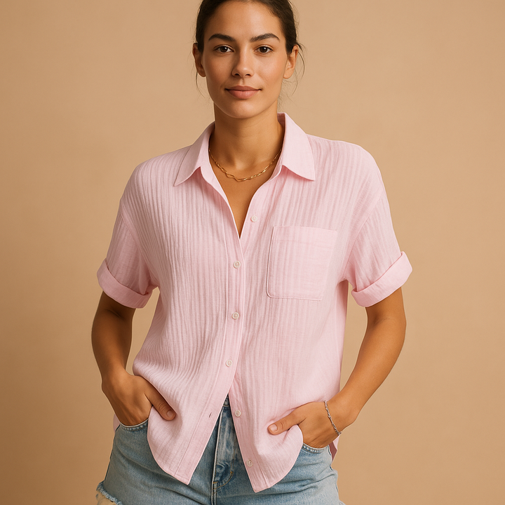 Soft, breathable short sleeve women's shirt with a chest pocket, offering comfort for warm weather and casual outfits.