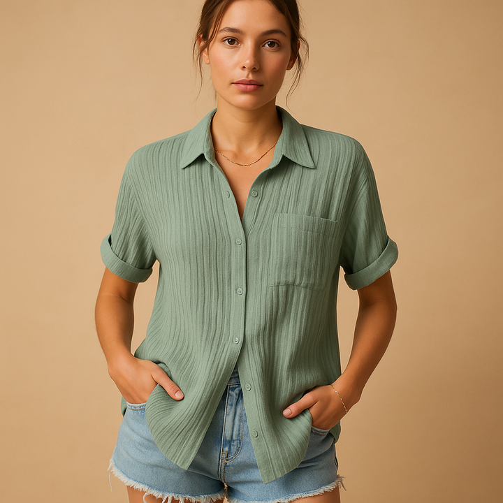 Stylish women's short sleeve top with chest pocket, a versatile button-up blouse for easy spring and summer casual looks.