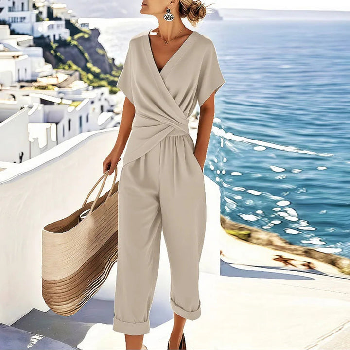 Women's effortless two-piece set featuring a stylish wrap top and comfortable high-waisted cropped pants, perfect for summer.